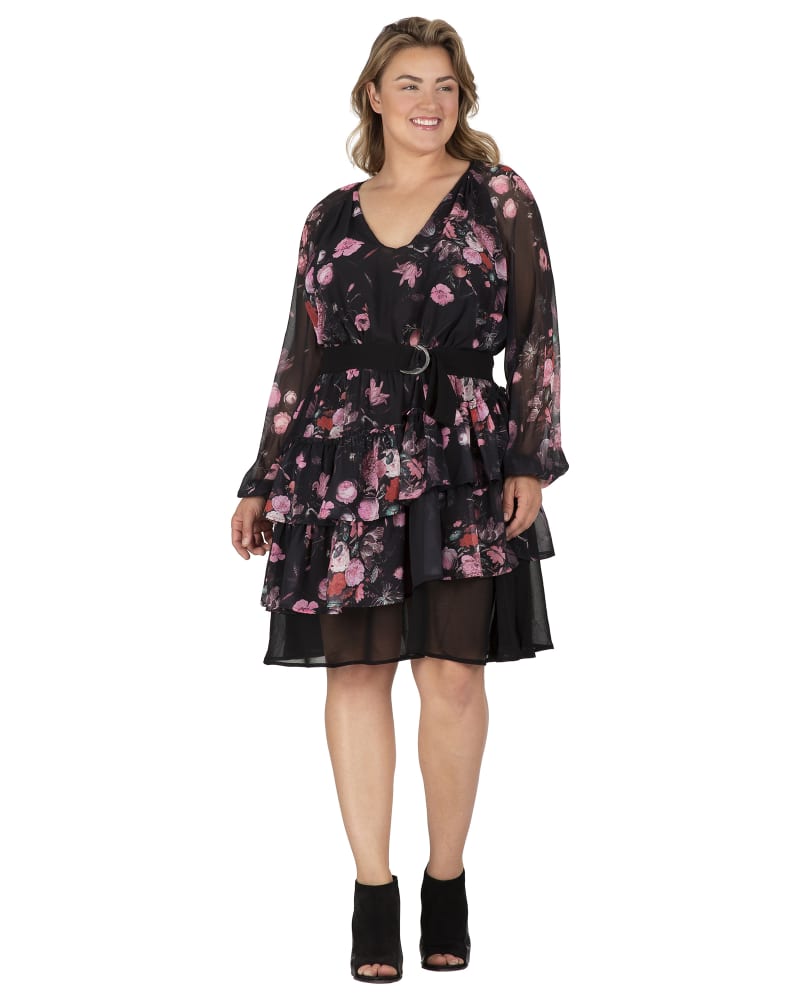 Front of a model wearing a size 18 Women's Floral Printed Tiered Swing Shift V Neck Mini Dress in Black Floral by Standards & Practices. | dia_product_style_image_id:276446